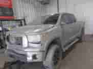 2013 Toyota Tundra Limited with VIN 5TFHW5F12DX289443, listed as a IAAI auction lot 42989623 with 195,739 mi miles and . Bid and sale history available at DreamBid. Image 2.