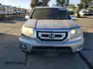 2010 Honda Pilot Touring with VIN 5FNYF4H97AB006893, listed as a Copart auction lot 82216215 with 237,897 mi miles and Salvage title. Bid and sale history available at DreamBid. Image 5.