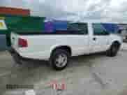 2000 Chevrolet S-10 с VIN 1GCCS1450YK211492, выставлен на аукционе Copart как лот 62325515 с пробегом 218 074 миль миль и Списание • Salvage title. История ставок и продаж доступна на DreamBid. Изображение 3.