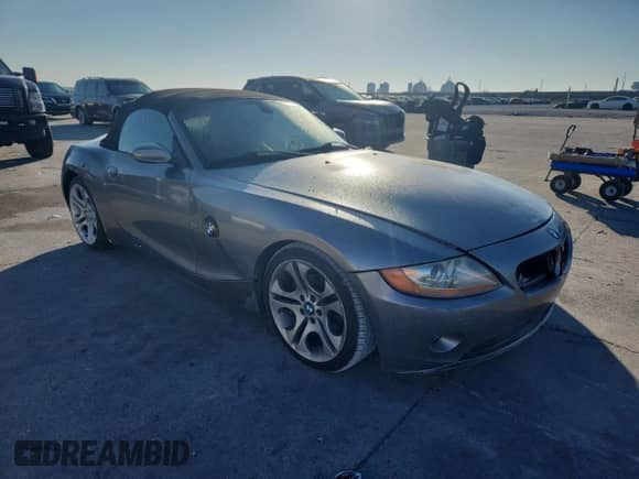 2004 BMW Z4 3.0i with VIN 4USBT53564LT25710, listed as a Copart auction lot 80996885 with 80,517 mi miles and Salvage title. Bid and sale history available at DreamBid. Image 4.