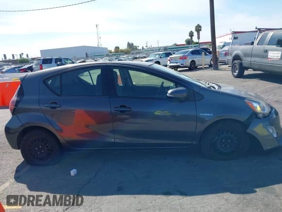 2015 Toyota Prius One z VIN JTDKDTB38F1111002, wystawiony jako IAAI lot #43250745 z przebiegiem 229 161 mil mil oraz . Historia ofert i sprzedaży dostępna na DreamBid. Obrazek 13.