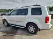 2011 Honda Pilot Touring с VIN 5FNYF3H94BB029768, выставлен на аукционе Copart как лот 71886275 с пробегом 186 127 миль миль и Списание • Salvage title. История ставок и продаж доступна на DreamBid. Изображение 2.