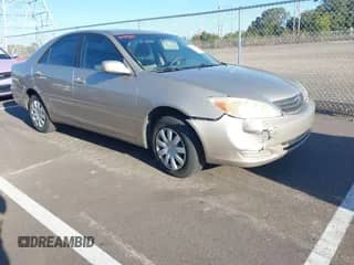 2004 Toyota Camry XLE with VIN 4T1BE32K54U825309, listed as a IAAI auction lot 43508143 with 291,825 mi miles and . Bid and sale history available at DreamBid. Image 1.