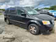 2010 Dodge Grand Caravan SXT with VIN 2D4RN5DX2AR135357, listed as a Copart auction lot 67761525 with 202,521 mi miles and Salvage title. Bid and sale history available at DreamBid. Image 4.