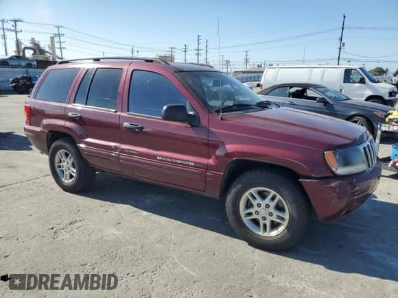 2002 Jeep Grand Cherokee Laredo with VIN 1J4GX48SX2C310790, listed as a Copart auction lot 85556515 with 165,485 mi miles and Salvage title. Bid and sale history available at DreamBid. Image 4.