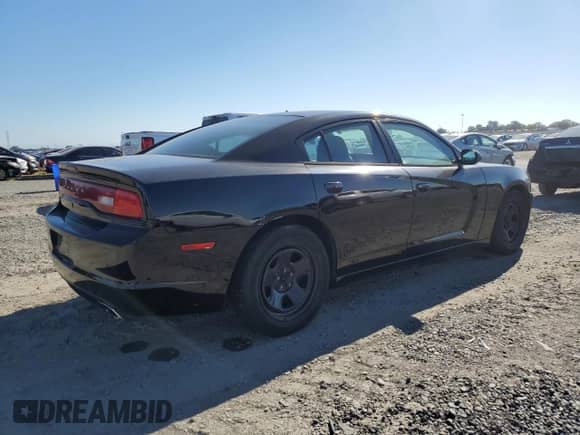 2012 Dodge Charger Police with VIN 2C3CDXAT1CH207083, listed as a Copart auction lot 90340205 with 95,434 mi miles and Clean title. Bid and sale history available at DreamBid. Image 3.