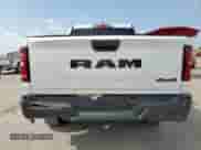 2025 Ram 1500 Tradesman with VIN 1C6RRFGG6SN543501, listed as a Copart auction lot 61486845 with 9,729 mi miles and Salvage title. Bid and sale history available at DreamBid. Image 6.