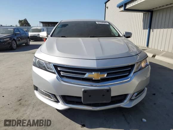 2017 Chevrolet Impala LT with VIN 2G1105SAXH9153244, listed as a Copart auction lot 68708565 with 164,700 mi miles and Salvage title. Bid and sale history available at DreamBid. Image 5.
