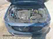 2023 Mazda CX-5 S Carbon Edition z VIN JM3KFBCM9P0211734, wystawiony jako IAAI lot #42439734 z przebiegiem 22 886 mil mil oraz . Historia ofert i sprzedaży dostępna na DreamBid. Obrazek 10.