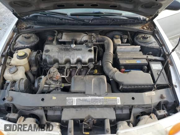2002 Saturn SL with VIN 1G8ZF52802Z255309, listed as a Copart auction lot 84173835 with 152,728 mi miles and Salvage title. Bid and sale history available at DreamBid. Image 11.