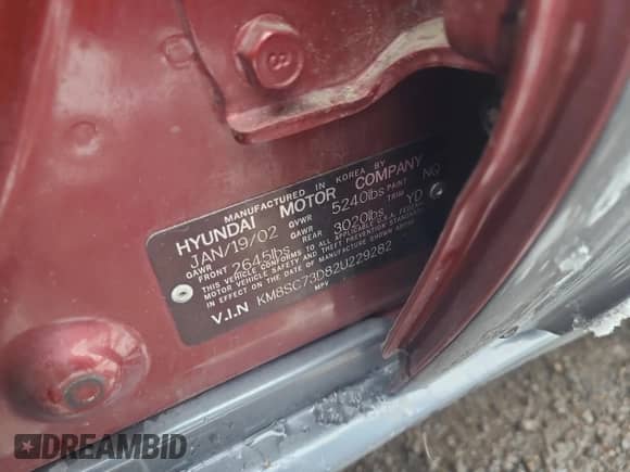 2002 Hyundai Santa Fe GLS z VIN KM8SC73D82U229282, wystawiony jako Copart lot #82037604 z przebiegiem Nie podano mil oraz Szkoda całkowita • Salvage title. Historia ofert i sprzedaży dostępna na DreamBid. Obrazek 13.