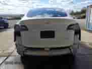 2021 Tesla Model Y Long Range z VIN 5YJYGDEE4MF295914, wystawiony jako Copart lot #85107055 z przebiegiem 49 996 mil mil oraz Szkoda całkowita • Salvage title. Historia ofert i sprzedaży dostępna na DreamBid. Obrazek 6.
