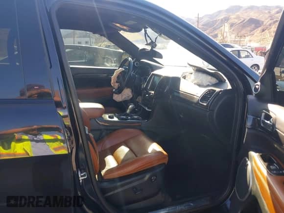 2016 Jeep Grand Cherokee SRT with VIN 1C4RJFDJ3GC404557, listed as a IAAI auction lot 43124966 with 112,863 mi miles and . Bid and sale history available at DreamBid. Image 5.