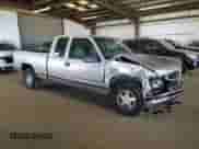 1999 Chevrolet Silverado 1500 with VIN 1GCEC19R1XR147244, listed as a Copart auction lot 48353905 with 264,369 mi miles and Salvage title. Bid and sale history available at DreamBid. Image 4.