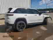 2023 Jeep Grand Cherokee Laredo with VIN 1C4RJHAG5PC508651, listed as a Copart auction lot 71157665 with 83,086 mi miles and Salvage title. Bid and sale history available at DreamBid. Image 3.