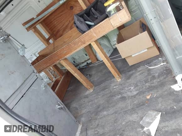 2007 Ford Econoline Cargo Commercial with VIN 1FTNE14W07DB13980, listed as a IAAI auction lot 42451731 with 210,380 mi miles and . Bid and sale history available at DreamBid. Image 8.