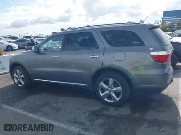 2012 Dodge Durango Citadel with VIN 1C4RDHEGXCC336158, listed as a IAAI auction lot 41408742 with 126,366 mi miles and . Bid and sale history available at DreamBid. Image 14.