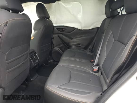 2023 Subaru Forester Wilderness с VIN JF2SKAMC7PH508573, выставлен на аукционе Copart как лот 82171845 с пробегом 17 668 миль миль и Списание • Salvage title. История ставок и продаж доступна на DreamBid. Изображение 11.