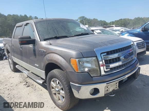 2013 Ford F-150 Lariat with VIN 1FTFW1ET5DFC93463, listed as a IAAI auction lot 43182949 with 133,397 mi miles and . Bid and sale history available at DreamBid. Image 1.