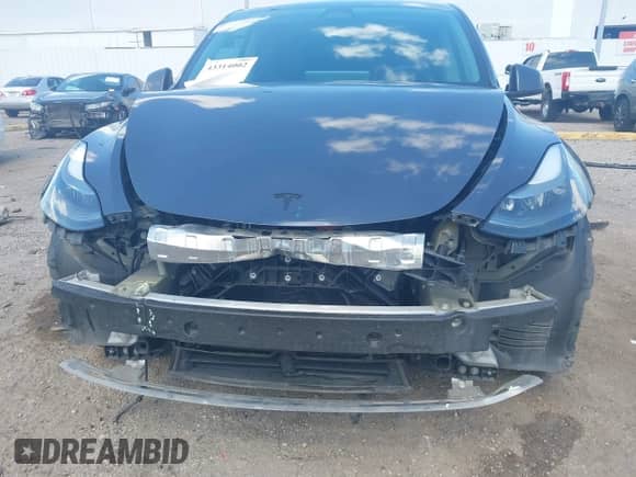 2023 Tesla Model Y Performance with VIN 7SAYGDEF4PF785348, listed as a IAAI auction lot 43314002 with 62,857 mi miles and . Bid and sale history available at DreamBid. Image 6.