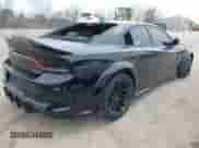 2022 Dodge Charger Scat Pack with VIN 2C3CDXGJ3NH127826, listed as a IAAI auction lot 41937411 with 43,619 mi miles and . Bid and sale history available at DreamBid. Image 4.