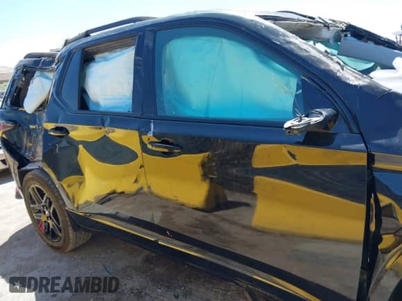 2020 Chevrolet Traverse Premier z VIN 1GNERKKW4LJ282612, wystawiony jako IAAI lot #42313667 z przebiegiem 90 922 mil mil oraz . Historia ofert i sprzedaży dostępna na DreamBid. Obrazek 14.