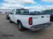 2000 Nissan Frontier XE with VIN 1N6DD21S1YC396142, listed as a IAAI auction lot 43082986 with 131,181 mi miles and . Bid and sale history available at DreamBid. Image 3.