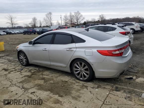 2012 Hyundai Azera с VIN KMHFH4JG3CA192580, выставлен на аукционе Copart как лот 82609194 с пробегом 127 887 миль миль и Списание • Salvage title. История ставок и продаж доступна на DreamBid. Изображение 2.