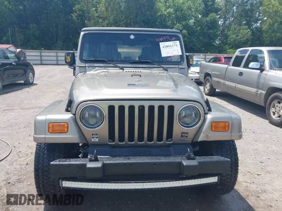 2003 Jeep Wrangler Sahara с VIN 1J4FA59S53P321353, выставлен на аукционе IAAI как лот 42891173 с пробегом 179 559 миль миль и . История ставок и продаж доступна на DreamBid. Изображение 12.