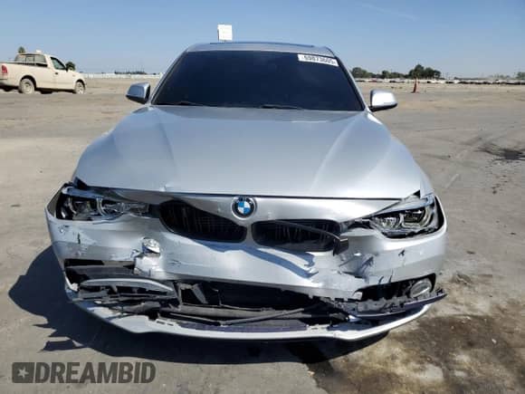 2018 BMW 3 Series 330e with VIN WBA8E1C52JA167468, listed as a Copart auction lot 69873605 with 98,631 mi miles and Salvage title. Bid and sale history available at DreamBid. Image 5.