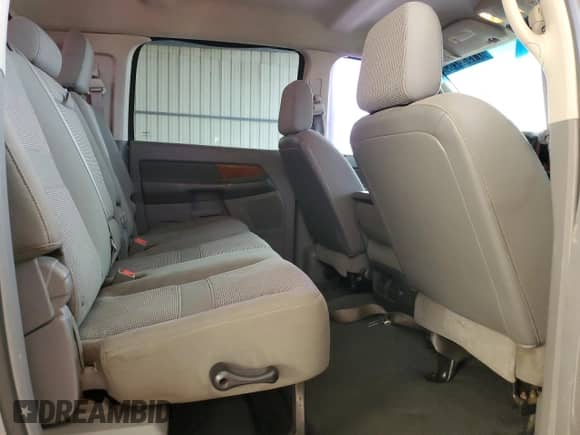 2006 Dodge 1500 SLT z VIN 3D7KS19D36G283101, wystawiony jako Copart lot #71929265 z przebiegiem 190 473 mil mil oraz Czysty tytuł • Clean title. Historia ofert i sprzedaży dostępna na DreamBid. Obrazek 10.