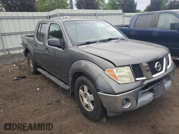 2005 Nissan Frontier LE with VIN 1N6AD07W95C431247, listed as a Copart auction lot 62153705 with 258,617 mi miles and Salvage title. Bid and sale history available at DreamBid. Image 4.