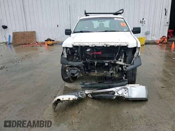 2013 Ford F-150 XL с VIN 1FTFX1CT2DKF61201, выставлен на аукционе Copart как лот 58761215 с пробегом Не указан миль и Списание • Salvage title. История ставок и продаж доступна на DreamBid. Изображение 13.