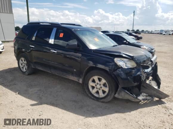 2008 Saturn Outlook XE with VIN 5GZER13728J180645, listed as a Copart auction lot 74107994 with 124,408 mi miles and Salvage title. Bid and sale history available at DreamBid. Image 4.