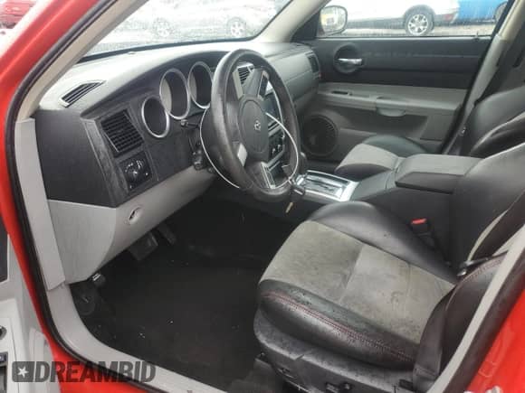 2007 Dodge Charger SRT-8 with VIN 2B3LA73W87H719829, listed as a Copart auction lot 56049515 with 92,789 mi miles and Salvage title. Bid and sale history available at DreamBid. Image 7.