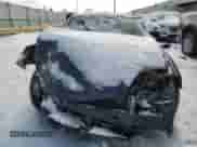 2005 Hyundai Tiburon GS with VIN KMHHM65D05U168710, listed as a Copart auction lot 88409505 with 135,207 mi miles and Salvage title. Bid and sale history available at DreamBid. Image 5.