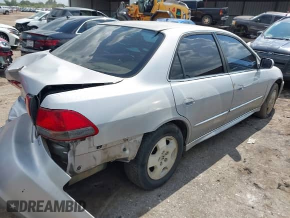 2002 Honda Accord EX with VIN 1HGCG16572A054301, listed as a IAAI auction lot 42986815 with 212,723 mi miles and . Bid and sale history available at DreamBid. Image 4.