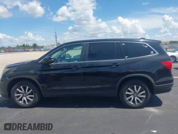 2019 Honda Pilot EX-L with VIN 5FNYF5H50KB018677, listed as a IAAI auction lot 42873434 with 64,717 mi miles and . Bid and sale history available at DreamBid. Image 14.