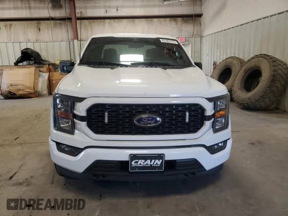 2023 Ford F-150 XL z VIN 1FTEW1EP7PKF57034, wystawiony jako Copart lot #67483175 z przebiegiem 63 343 mil mil oraz Szkoda całkowita • Salvage title. Historia ofert i sprzedaży dostępna na DreamBid. Obrazek 5.