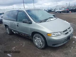 1999 Dodge Caravan SE with VIN 1B4GP44R4XB854348, listed as a IAAI auction lot 41871640 with 169,312 mi miles and . Bid and sale history available at DreamBid. Image 1.