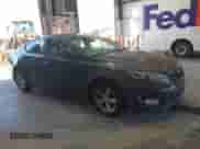 2015 Kia Optima LX z VIN KNAGM4A70F5621592, wystawiony jako IAAI lot #43327417 z przebiegiem 184 055 mil mil oraz . Historia ofert i sprzedaży dostępna na DreamBid. Obrazek 1.
