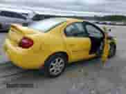 2004 Dodge Neon SXT with VIN 1B3ES56C84D538802, listed as a Copart auction lot 82187635 with 159,319 mi miles and Salvage title. Bid and sale history available at DreamBid. Image 3.