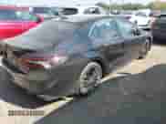 2023 Toyota Camry XSE with VIN 4T1K61AK3PU100136, listed as a IAAI auction lot 43222647 with 77,489 mi miles and . Bid and sale history available at DreamBid. Image 4.