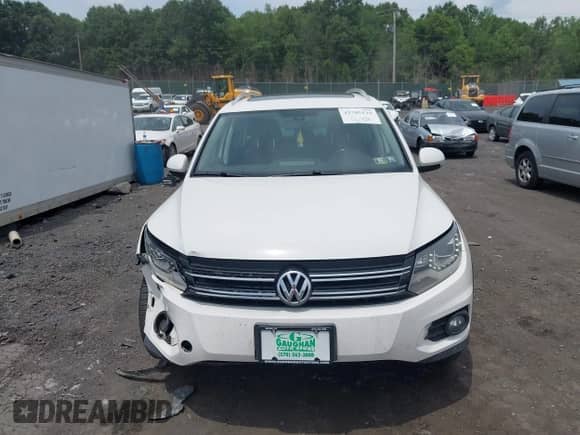 2013 Volkswagen Tiguan S z VIN WVGBV3AX6DW577296, wystawiony jako IAAI lot #42705129 z przebiegiem 110 709 mil mil oraz . Historia ofert i sprzedaży dostępna na DreamBid. Obrazek 12.