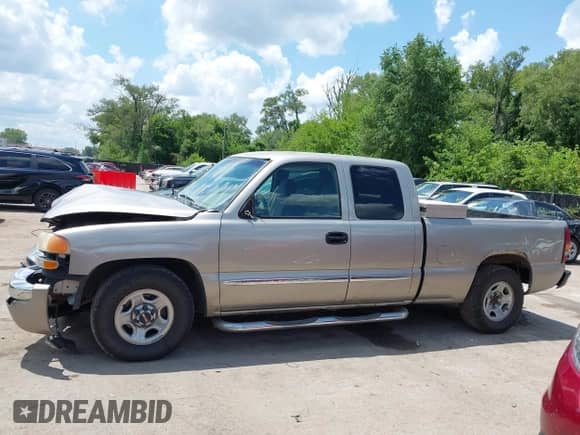 2003 GMC Sierra 1500 SLE with VIN 2GTEC19T031377419, listed as a IAAI auction lot 42665454 with 199,579 mi miles and . Bid and sale history available at DreamBid. Image 14.