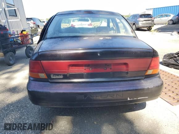 1999 Saturn SL z VIN 1G8ZK5276XZ314325, wystawiony jako Copart lot #66461025 z przebiegiem 227 494 mil mil oraz Szkoda całkowita • Salvage title. Historia ofert i sprzedaży dostępna na DreamBid. Obrazek 6.