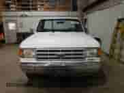 1989 Ford F-150 with VIN 1FTEF14Y7KKB65464, listed as a Copart auction lot 85364165 with 88,573 mi miles and Salvage title. Bid and sale history available at DreamBid. Image 5.