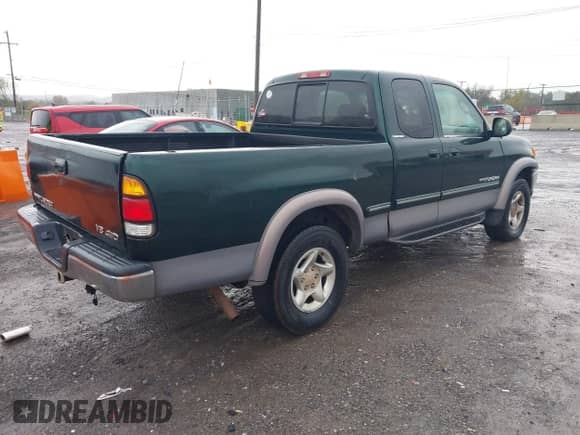 2000 Toyota Tundra Limited z VIN 5TBBT4819YS029700, wystawiony jako IAAI lot #43530359 z przebiegiem 355 202 mil mil oraz . Historia ofert i sprzedaży dostępna na DreamBid. Obrazek 4.