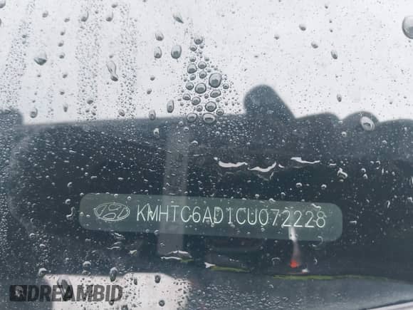 2012 Hyundai Veloster w/Gray Int z VIN KMHTC6AD1CU072228, wystawiony jako IAAI lot #41197169 z przebiegiem 214 994 mil mil oraz . Historia ofert i sprzedaży dostępna na DreamBid. Obrazek 9.