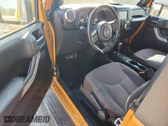 2014 Jeep Wrangler Sahara с VIN 1C4AJWBG1EL266289, выставлен на аукционе Copart как лот 81712295 с пробегом 128 403 миль миль и Списание • Salvage title. История ставок и продаж доступна на DreamBid. Изображение 8.